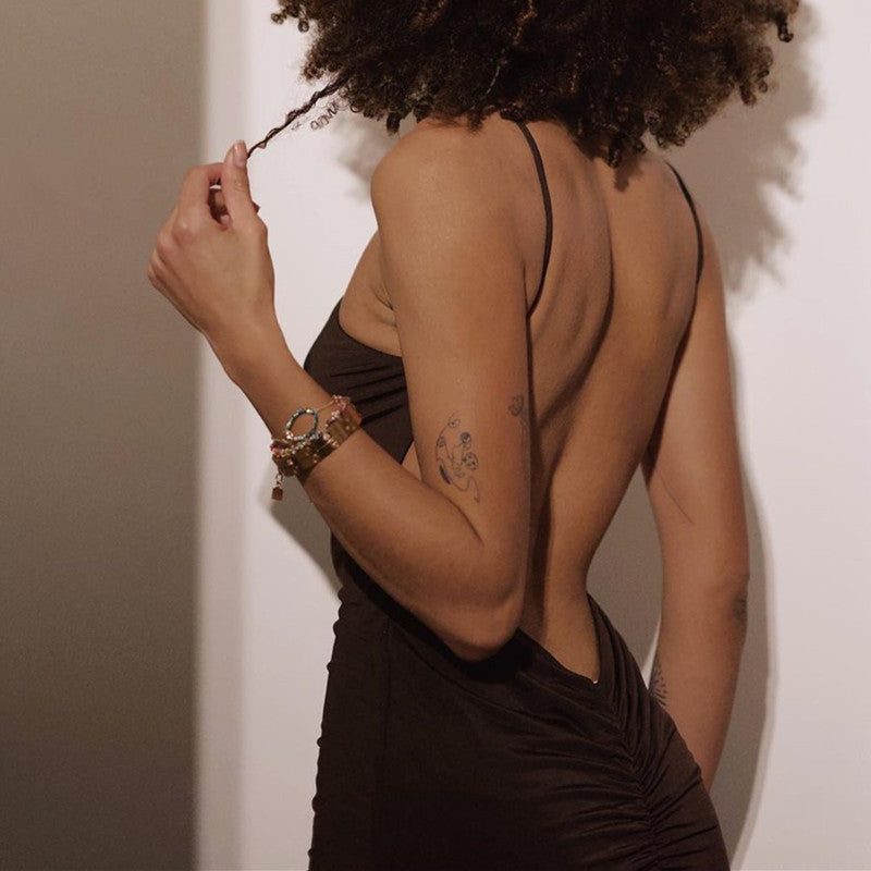 Robe longue sans manches à col licou de couleur unie